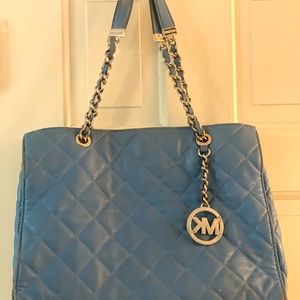 Micheal Kors sky blue purse.